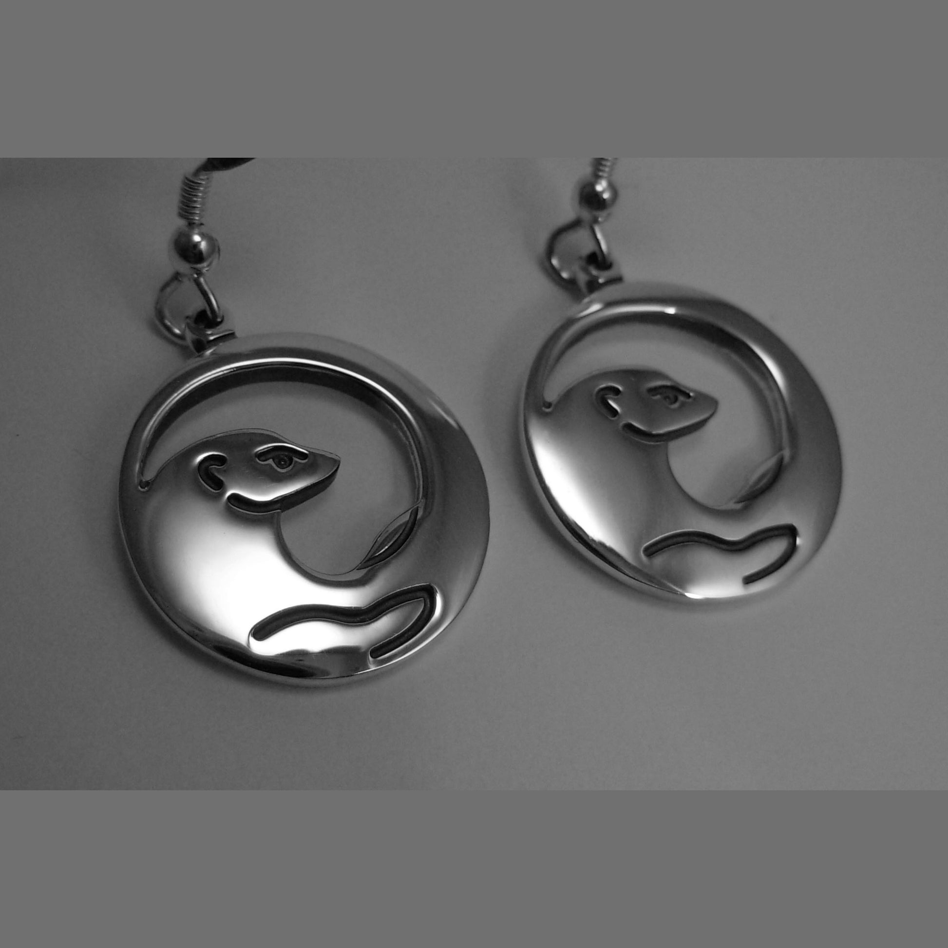 Skye Otter silver dangle earrings