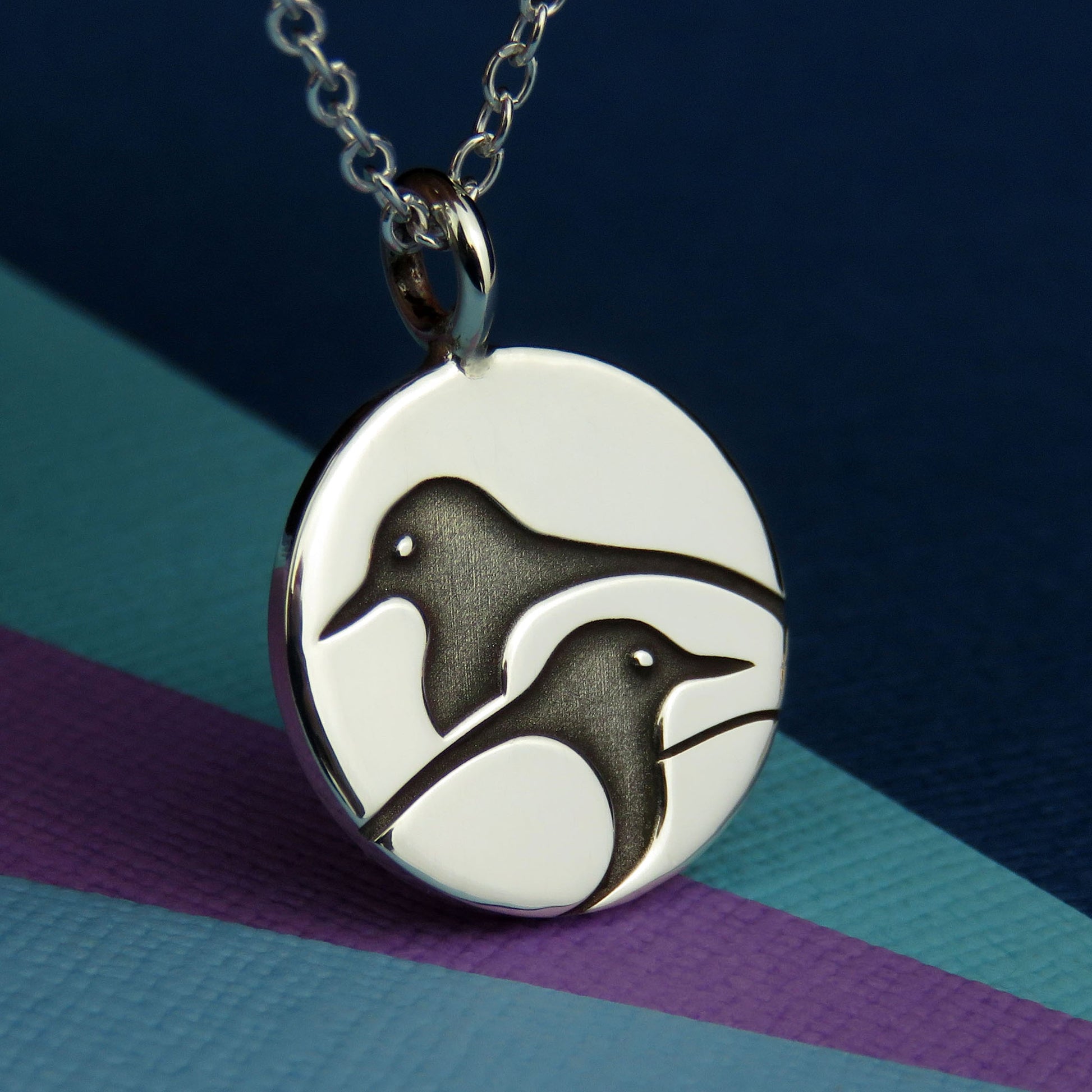 Magpies silver pendant necklace