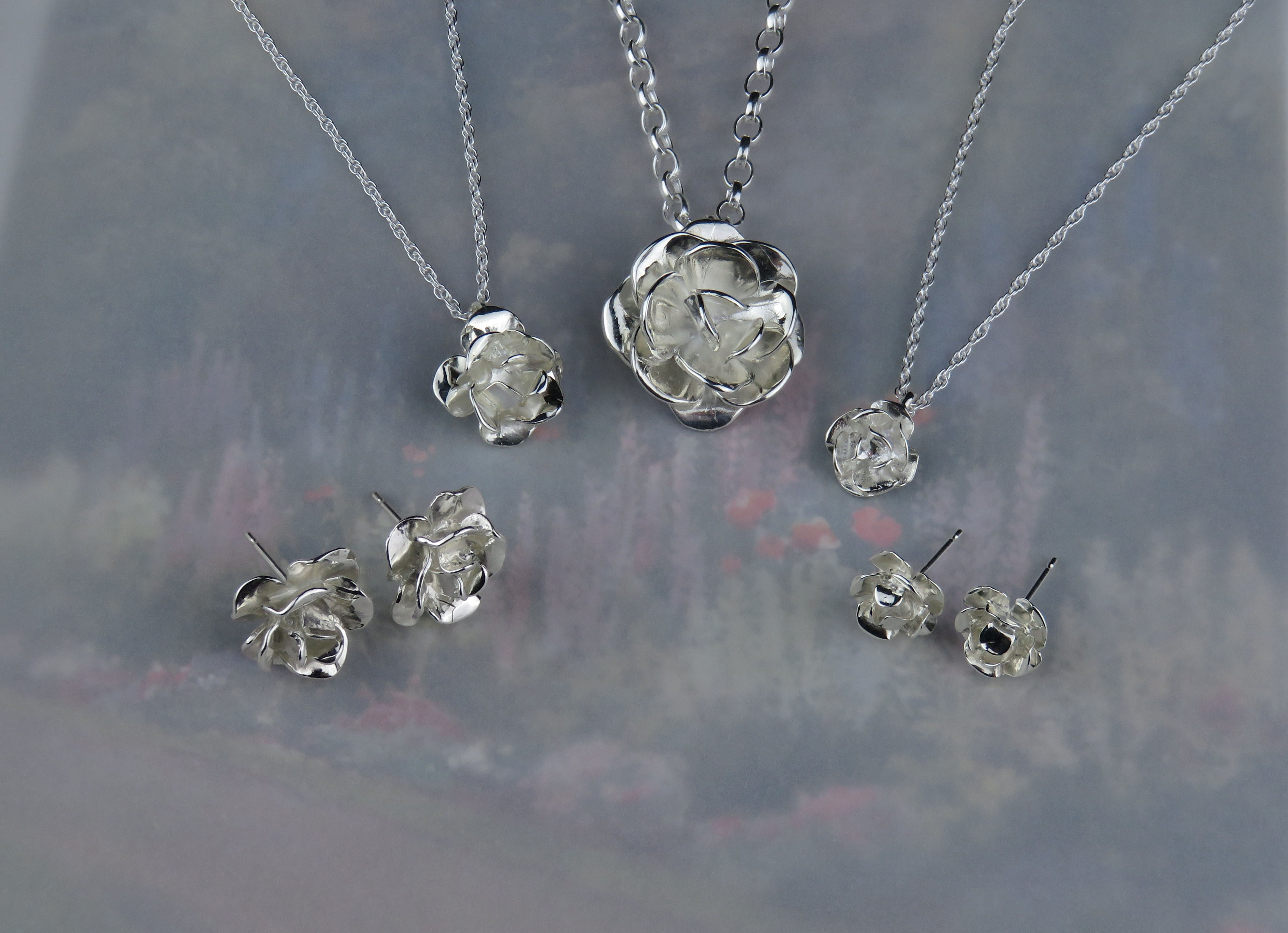 Skye Rose silver pendant necklace and stud earrings collection