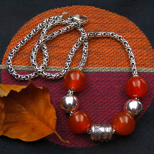 Colours of Autumn carnelian silver bead necklace with Skye Heron bead